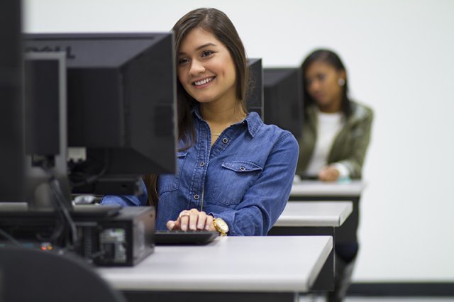 Female student in computer lab
